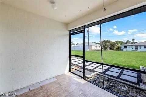 view of unfurnished sunroom