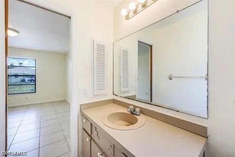 bathroom featuring vanity and tile patterned floors