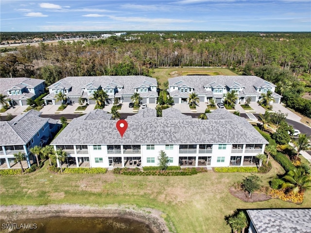 bird's eye view with a residential view and a forest view