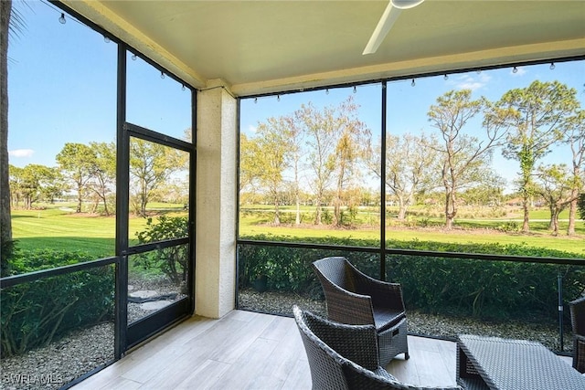 sunroom featuring a healthy amount of sunlight