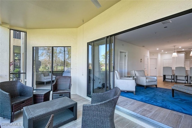 interior space featuring an outdoor hangout area and visible vents