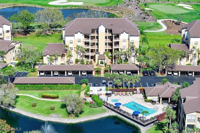 bird's eye view featuring a water view and golf course view