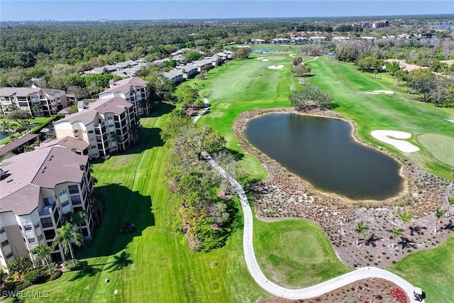 birds eye view of property featuring a water view and golf course view