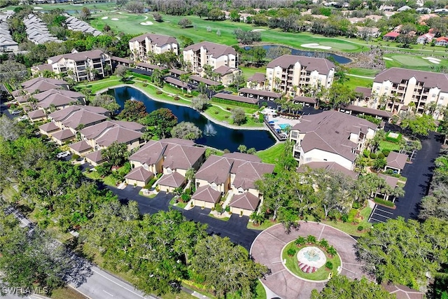 aerial view featuring a water view, a residential view, and golf course view