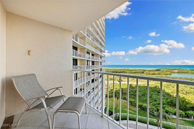 balcony featuring a water view