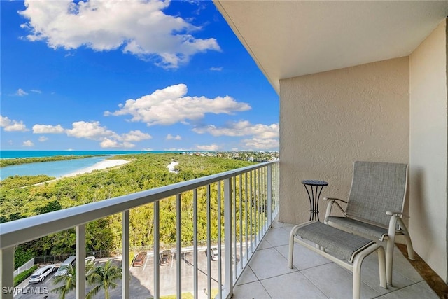 balcony featuring a water view