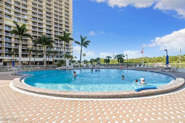 view of pool with fence