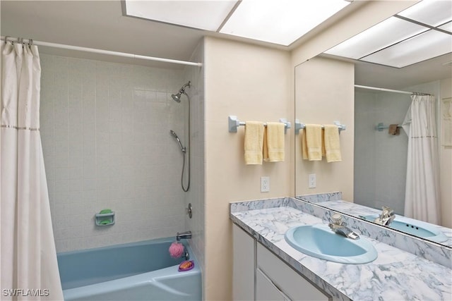 bathroom with vanity and shower / tub combo with curtain