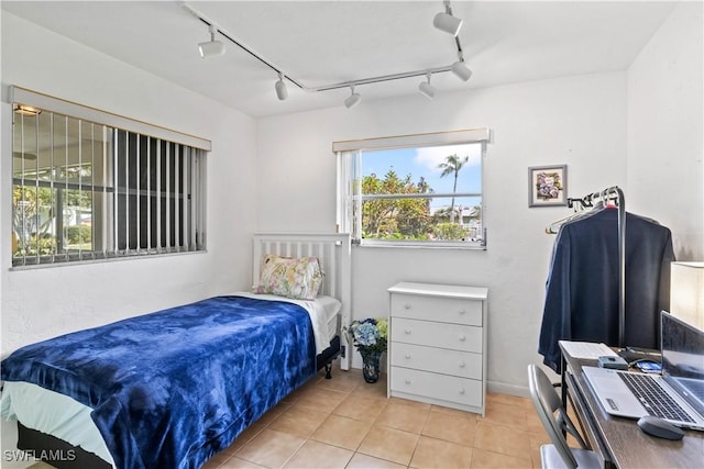 bedroom featuring tile patterned flooring