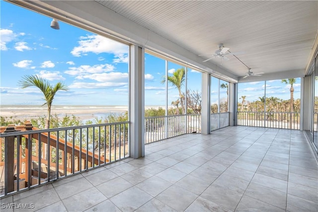 unfurnished sunroom featuring plenty of natural light