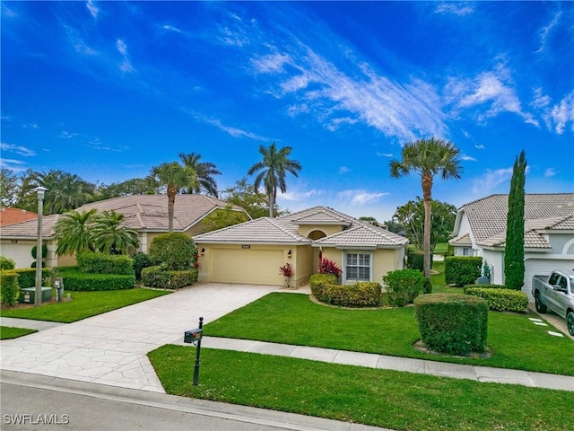 view of front facade with a tiled roof, an attached garage, decorative driveway, a front yard, and stucco siding