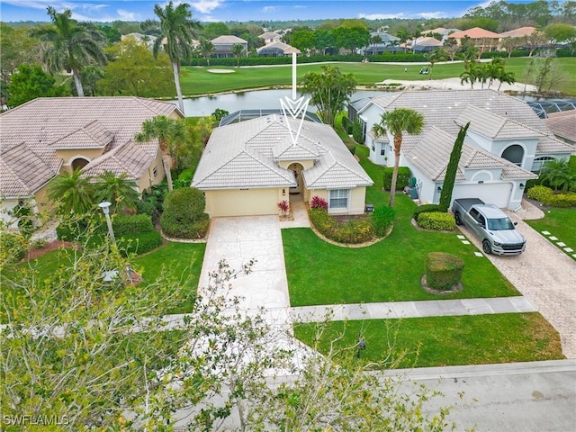 aerial view featuring a water view and a residential view