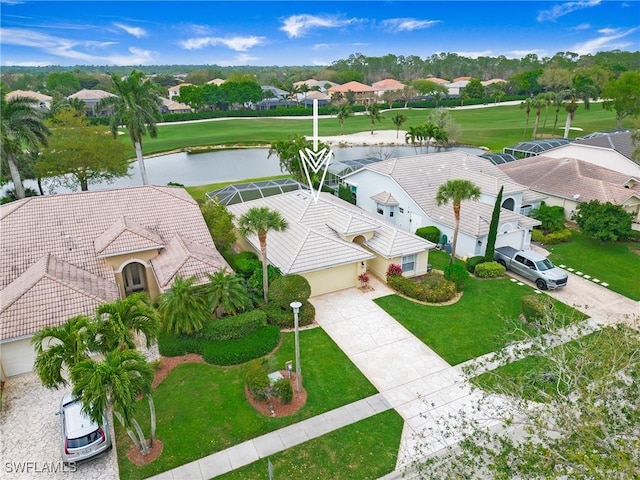 bird's eye view featuring a water view and a residential view