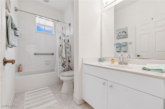 bathroom featuring tile patterned floors, toilet, shower / bath combo, and vanity