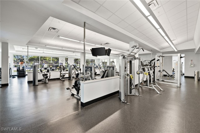 workout area with baseboards and visible vents