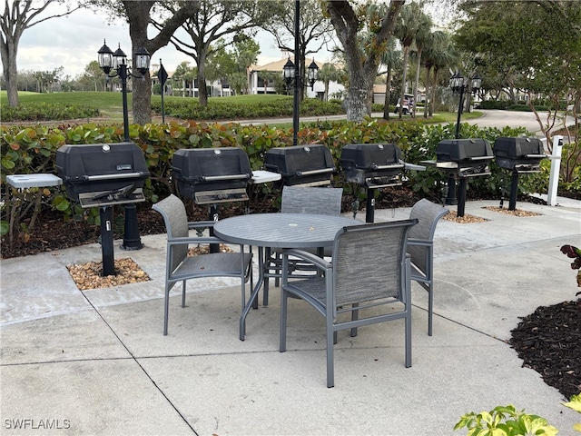 view of patio / terrace with outdoor dining area and grilling area