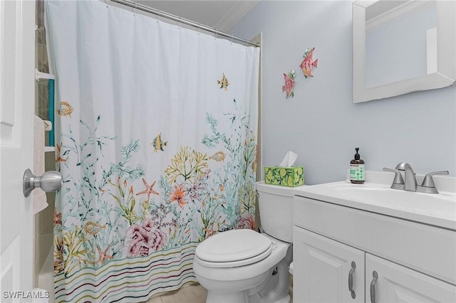 bathroom with vanity, toilet, a shower with curtain, and ornamental molding