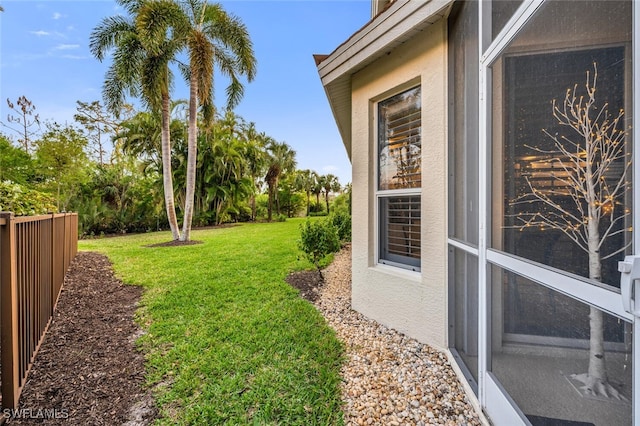 view of yard with fence