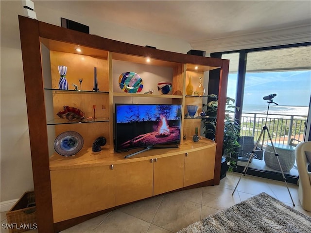 living area featuring light tile patterned floors