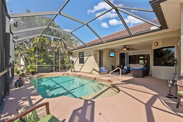 outdoor pool with glass enclosure, a patio, an outdoor living space, and ceiling fan