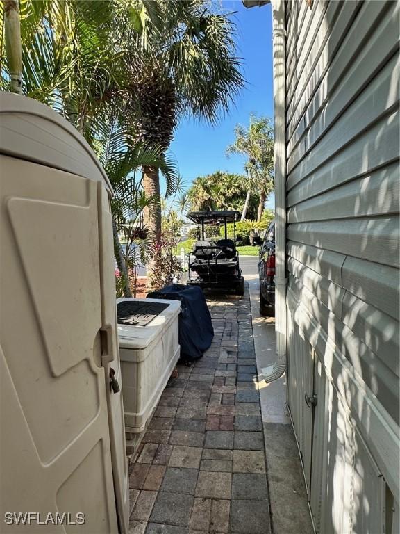 view of side of home featuring a patio area