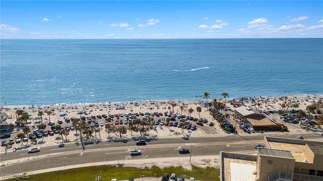 aerial view featuring a water view and a beach view