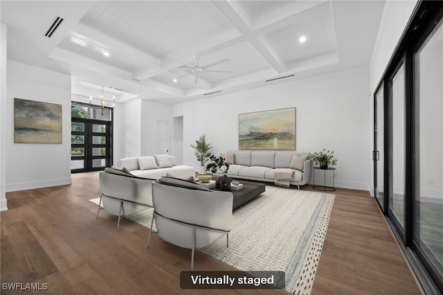 3233 64th St SW, Naples, FL 34105 - living area featuring coffered ceiling, wood finished floors, a ceiling fan, beamed ceiling, and a chandelier
