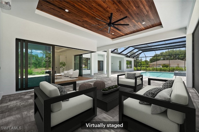 3233 64th St SW, Naples, FL 34105 - view of patio / terrace with an outdoor living space, a ceiling fan, an outdoor pool, and glass enclosure