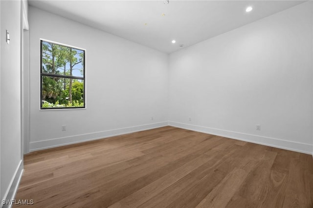 3233 64th St SW, Naples, FL 34105 - spare room featuring light wood-style flooring and recessed lighting