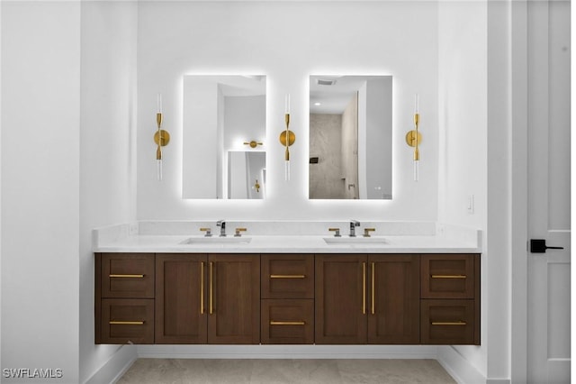 3233 64th St SW, Naples, FL 34105 - bathroom featuring double vanity and a shower