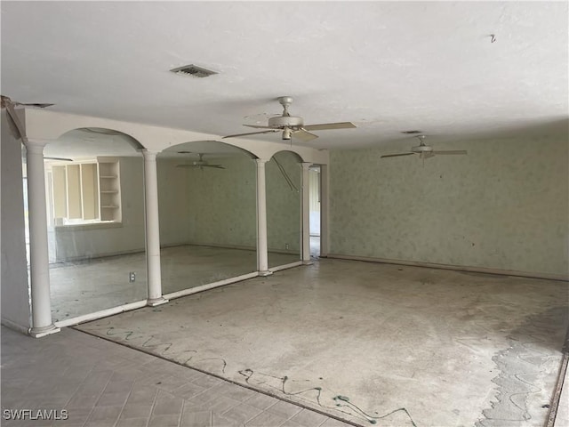 view of patio / terrace featuring ceiling fan and visible vents