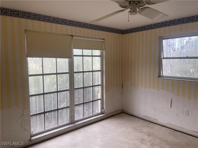 545 Boulder Dr, Sanibel, FL 33957 - carpeted empty room featuring wallpapered walls and a ceiling fan