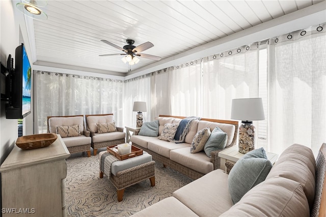 living area with wooden ceiling and a ceiling fan