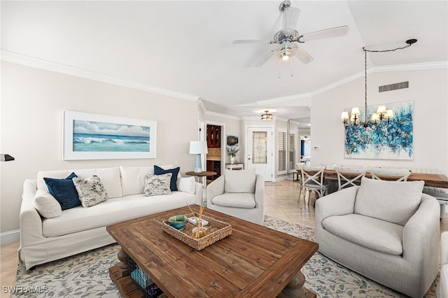 living room featuring visible vents, crown molding, lofted ceiling, ceiling fan with notable chandelier, and light tile patterned flooring