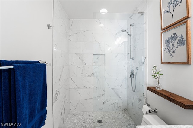 full bath featuring a marble finish shower