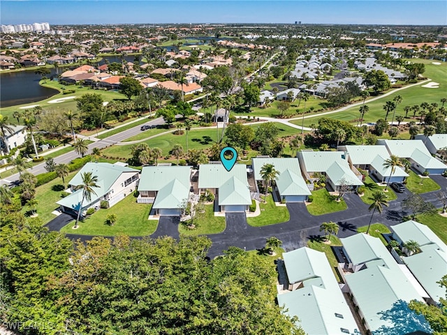 bird's eye view featuring a residential view, a water view, and view of golf course