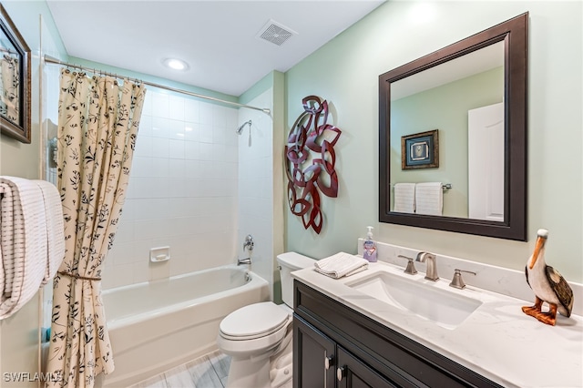 full bath featuring toilet, shower / bath combo, visible vents, and vanity