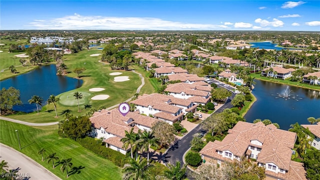 bird's eye view with a residential view, a water view, and golf course view