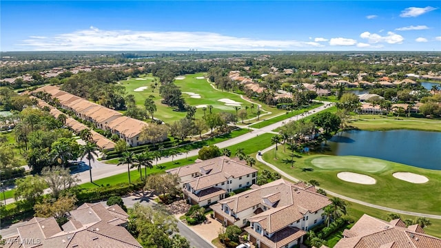 bird's eye view featuring view of golf course, a water view, and a residential view