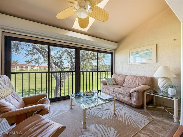 sunroom / solarium with lofted ceiling and ceiling fan