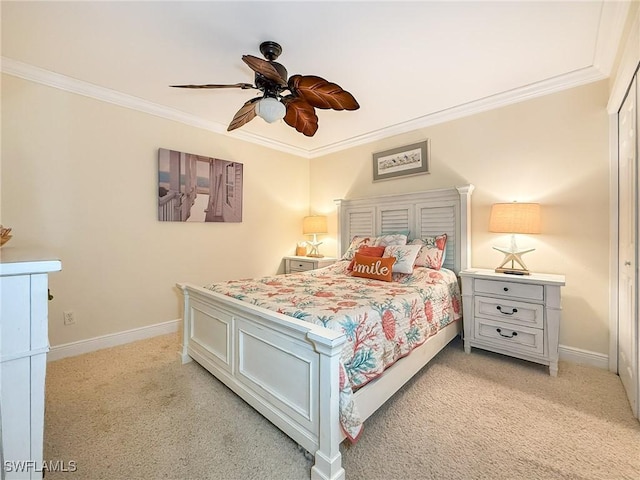 bedroom with baseboards, ornamental molding, a ceiling fan, and light colored carpet