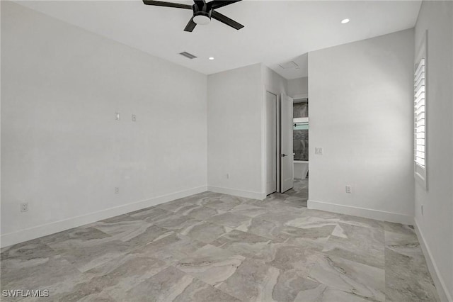 empty room with visible vents, marble finish floor, recessed lighting, baseboards, and ceiling fan