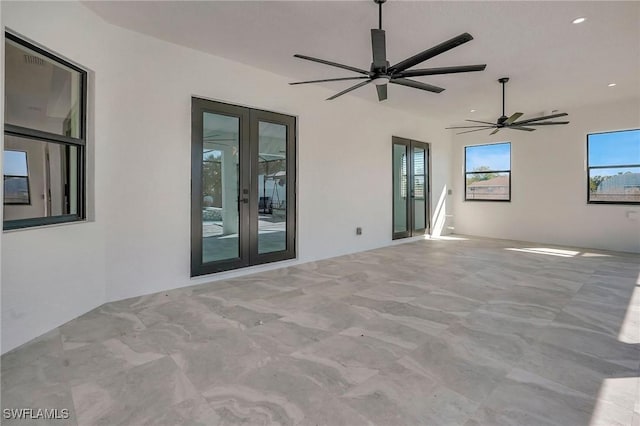 view of patio / terrace featuring french doors and ceiling fan