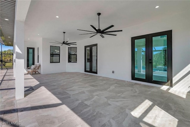 view of patio / terrace featuring french doors and ceiling fan