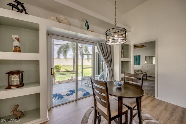 dining area featuring light wood finished floors