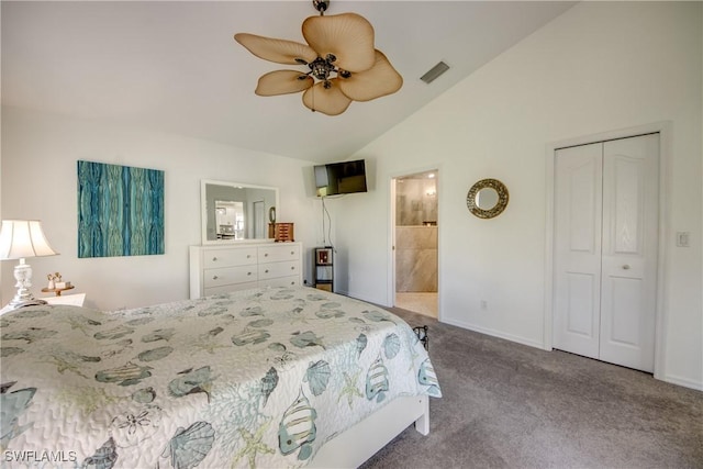 carpeted bedroom with baseboards, visible vents, ensuite bathroom, vaulted ceiling, and a closet