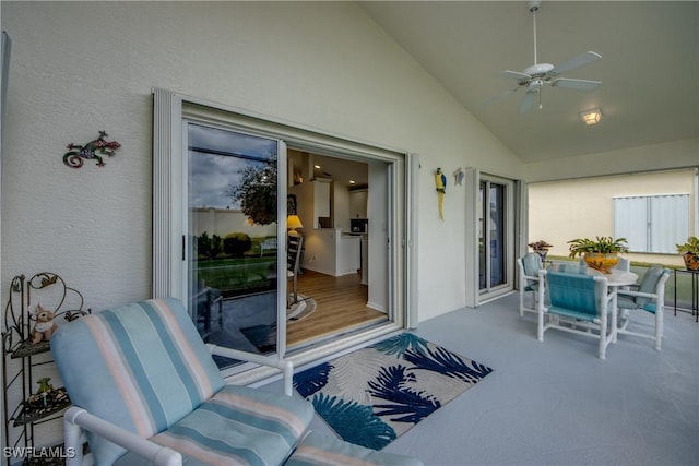 view of patio featuring a ceiling fan and outdoor dining area