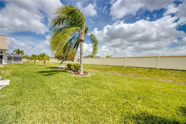 view of yard with fence