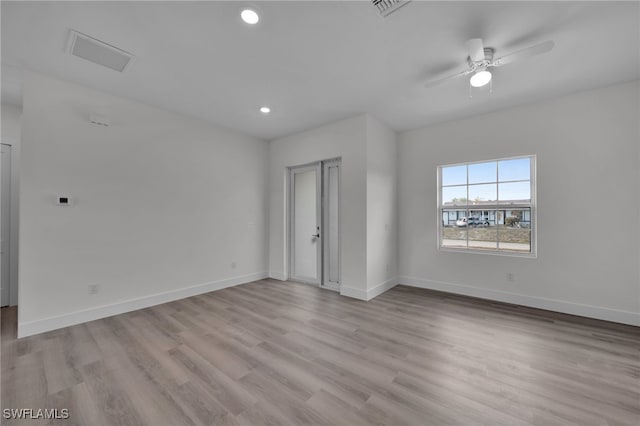 3109 11th St W, Lehigh Acres, FL 33971 - unfurnished room with ceiling fan, visible vents, baseboards, light wood finished floors, and recessed lighting