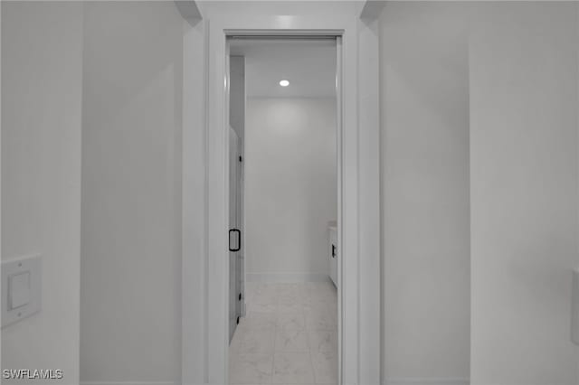 3109 11th St W, Lehigh Acres, FL 33971 - hall with baseboards and marble finish floor